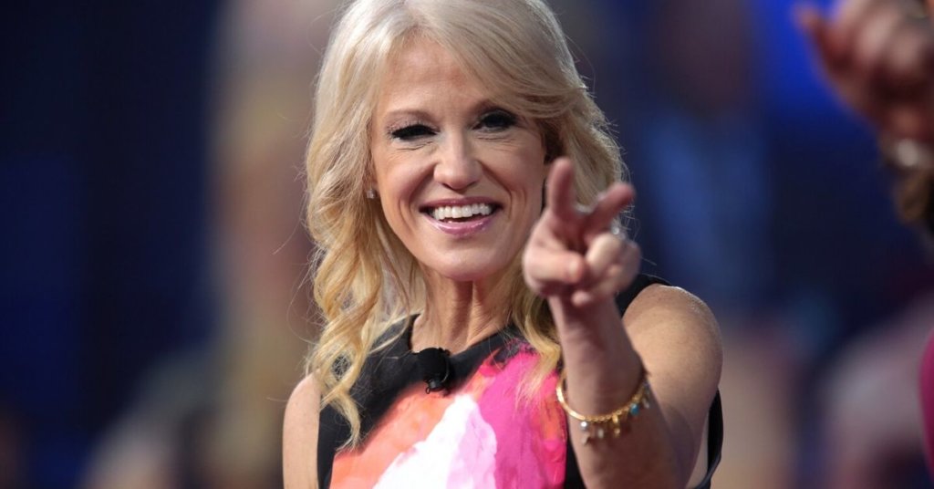 Kellyanne Conway holding up two fingers