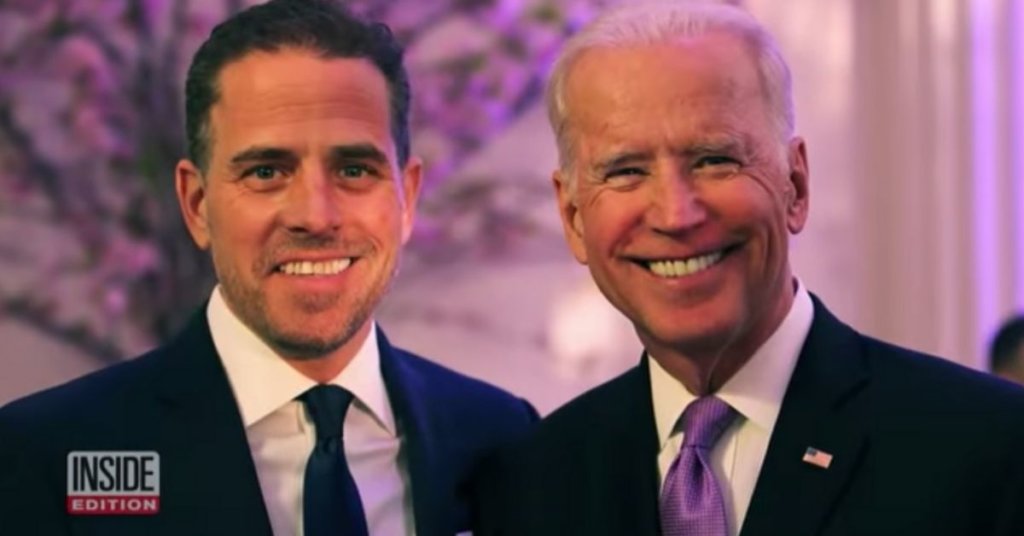 Joe Biden standing next to his son Hunter