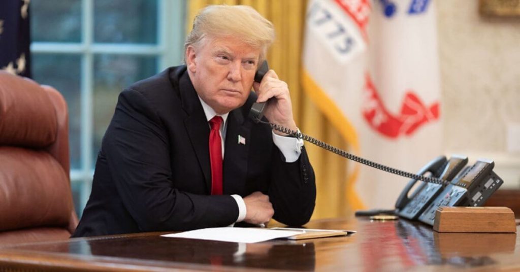 Trump on the phone in the Oval Office