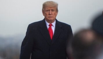 President Trump in a suit with a red tie