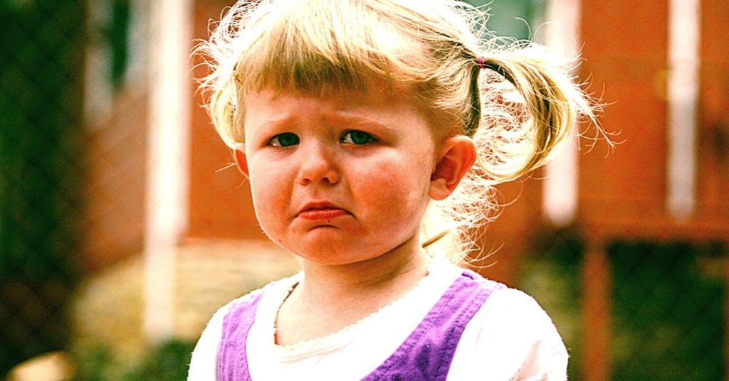 A little girl with a sad face
