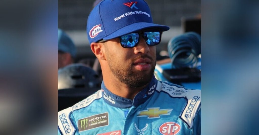 A photograph of Bubba Wallace in his race gear.