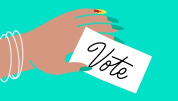 cartoon depiction of a hand holding a card that says vote