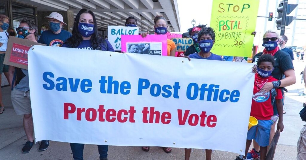 Demonstrators supporting the USPS