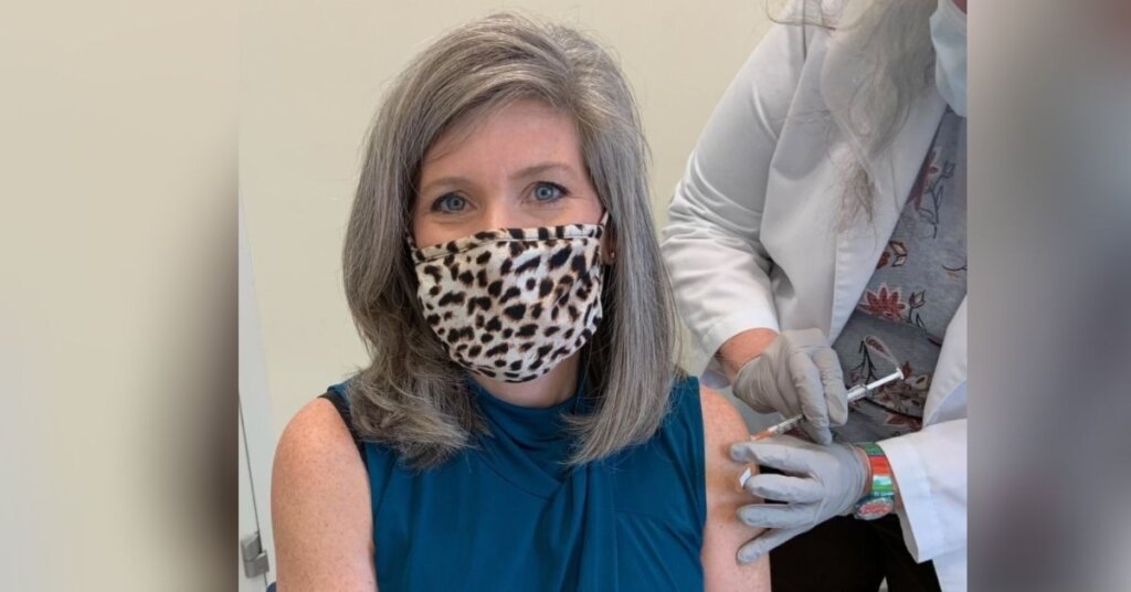 Joni Ernst getting a COVID vaccine